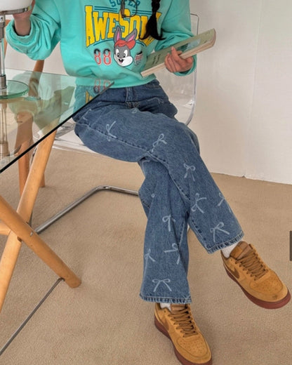PRINTED BOW STRAIGHT WASH DENIM PANTS