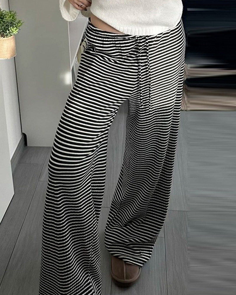 SLOUCHY STRIPED LACE-UP LOW-RISE DRAPED TROUSERS