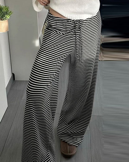 SLOUCHY STRIPED LACE-UP LOW-RISE DRAPED TROUSERS