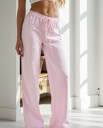 SLOUCHY STRIPED LACE-UP LOW-RISE DRAPED TROUSERS
